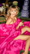 Model wearing a luxurious pink dress at Ayrburn